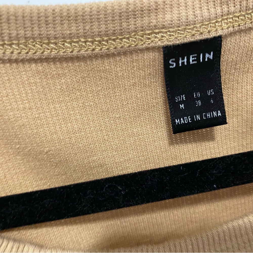 cropped brown shirt